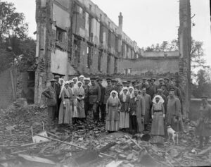 Canadian Army Medical Corps medical staff in rubble of bombed hospital in France