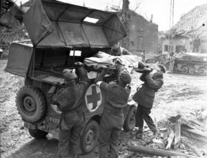Patient being load in to jeep ambulance in Italy
