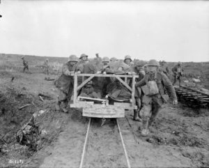 German POWs help evacuate Canadian wounded on trench railway in France