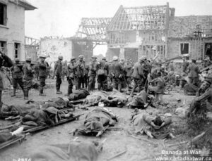 German prisoners of war awaiting medical care in destroyed Belgium village