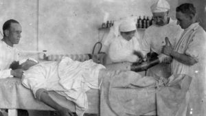 Draining infected leg wound in Canadian general hospital