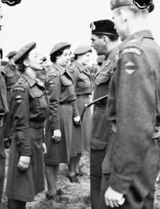 Lieutenant-General G.G. Simonds, General Officer Commanding 2 Canadian Corps, inspecting the personnel of No.2 Casualty Clearing Station (RCAMC), Oldenburg, Germany, 2 June 1945. Source: TBC